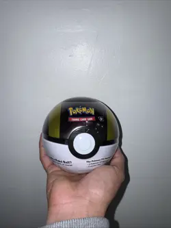 Pokemon TCG Ultra Ball Tin (Q4 2025 - Black/Yellow, 4.5 in - 3 Booster Packs - Image 1