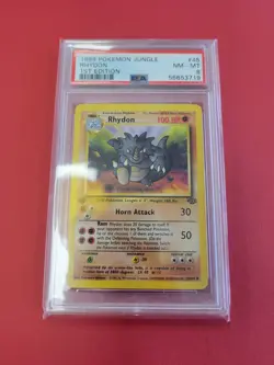 PSA 8 NM-Mint 1st Edition 1999 Rhydon 45/64 Jungle Uncommon Vintage Pokemon Card - Image 1