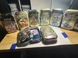 Full Set 8 EMPTY Pokemon PRISMATIC EVOLUTIONS Mini Tins & Eevee Coins (NO PACKS) - Image 1