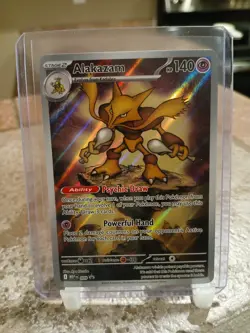 Pokemon TCG Mega Evolution Alakazam 009 Black Star Promos Illustration Rare - Image 1