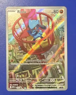 Pokemon Mega Evolutions Riolu Black Star Promo Illustration Rare #10 NM - Image 1