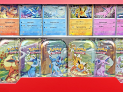 POKEMON TCG PRISMATIC EVOLUTIONS MINI TIN 8-PACK ART SET 2025 COSTCO EXCLUSIVE! - Image 3