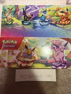 Prismatic Evolutions - Set of 8 Sealed Mini Tins w/ Open Display Box - Image 1