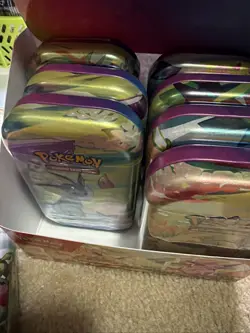 Prismatic Evolutions - Set of 8 Sealed Mini Tins w/ Open Display Box - Image 3