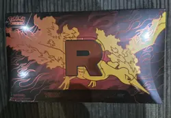 Pokemon TCG Team Rocket's Moltres ex Ultra-Premium Collection UPC in hand - Image 1