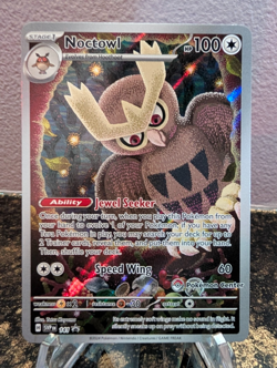 Pokemon TCG Stellar Crown Noctowl 141 Black Star Promo Pokemon Center Stamp - Image 1