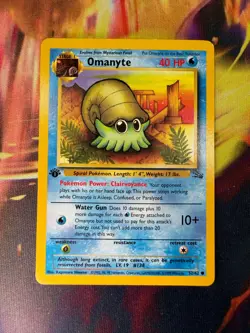 Omanyte 52/62 LP-NM Common 1st Edition Fossil 1999 Pokemon TCG - Image 1