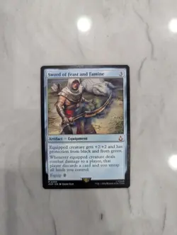 Sword of Feast and Famine Universes Beyond: Assassin's Creed Regular Near Mint - Image 1