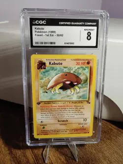 1999 POKEMON FOSSIL 1ST EDITION #50 KABUTO CGC 8 - Image 1