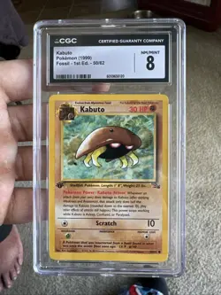 1999 POKEMON FOSSIL 1ST EDITION #50 KABUTO CGC 8 - Image 1