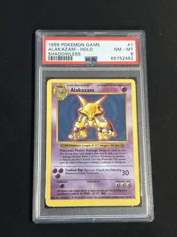 1999 POKEMON BASE SET SHADOWLESS #1 ALAKAZAM-HOLO PSA 8 NM-MT - Image 1