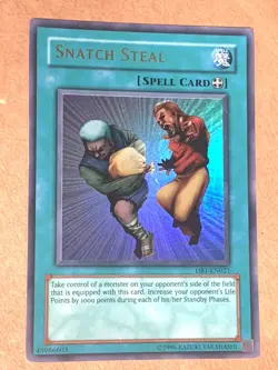 yugioh SNATCH STEAL DB1-EN021 Unlimited Edition Ultra Rare near mint - Image 1