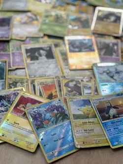 Pokemon Bulk Card Lot: 147 Total Cards (49 Rares, 9 Holo, 9 Rev Holo, 80 C/UC) - Image 1