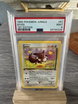 Pokemon TCG Eevee Jungle 51/64 Regular 1st Edition PSA 9 - Image 1