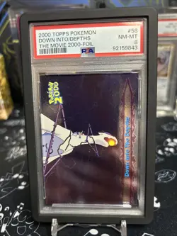 2000 TOPPS POKEMON THE MOVIE 2000 58 DOWN INTO THE DEPTHS FOIL PSA 8 - Image 1