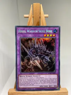Fossil Warrior Skull Bone - BLAR-EN008 - Secret Rare - 1st Edition - Yugioh - Image 1