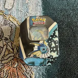 Pokemon Evolutions Tin Vaporeon W/ Promo 50+ Cards and 3 coins - Image 1