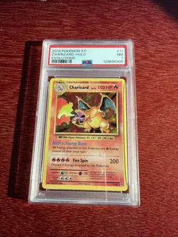 Pokemon TCG Charizard Evolutions 11/108 Reverse Holo PSA 7 - Image 1