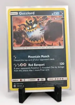 Guzzlord 136/236 Cosmic Eclipse 2019 Holo Rare Card NM Pokemon TCG - Image 1
