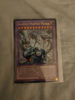 DRAGON MASTER MAGIA 1ST EDITION PRISMATIC ULTIMATE RARE RA04-EN055 YUGIOH NM - Image 1