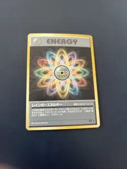 1997 Pokemon Japanese Rocket Gang Rainbow Energy Holo WOTC - Image 1