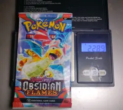 Heavy 22.89g Pokemon Tcg obsidian flames Booster Pack Factory Sealed New - Image 1