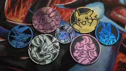 Assorted Pokemon Coin Lot 7 Coins Tcg - Image 1