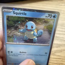 Pokemon Squirtle 048 - Cosmos Holo Promo - With SWIRL Near Squirtles Hand - Image 1