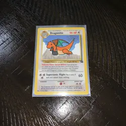 1999 Dragonite WB The First Movie Stamp Black Star Promo 5 Pokemon Card - Image 1