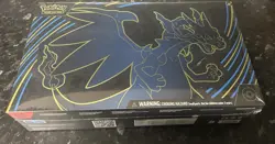 Pokemon Trading Card Game: Mega Charizard X ex Ultra-Premium Collection in hand - Image 1