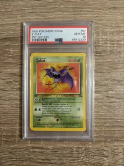 1999 POKEMON FOSSIL 1ST ED #57 ZUBAT PSA 10 - Image 1