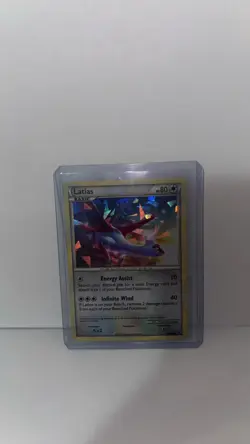 Latias HGSS10 Black Star Promos Cosmos Holo Pokemon Card LP Half Swirl - Image 1