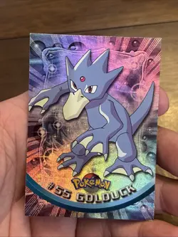 1999 Topps Pokemon TV Animation Edition 55 Golduck Foil Blue Logo Rainbow Foil - Image 1