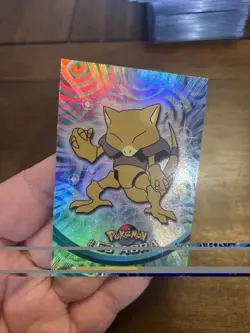 1999 Topps Pokemon TV Animation #63 Abra Rainbow Foil Black Logo - Image 2