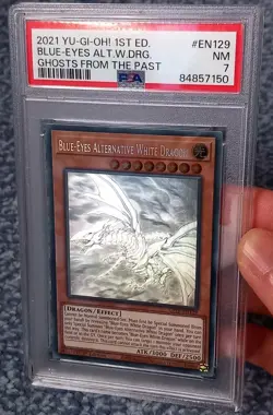 PSA 7 Blue-Eyes Alternative White Dragon GFTP-EN129 1st Edition Ghost Rare 2021 - Image 1