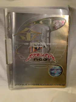 1999 Japanese Pokemon Neo Genesis Binder With 9 Cards Included - Image 1