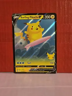 Surfing Pikachu V 008/025 Holo Rare Celebrations 25th Pokemon Card NM - Image 1