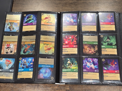 Lorcana card bundle - first chapter, whisper, fabled + folders - Image 1