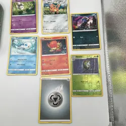 Pokemon TCG Celebrations Mini Tin (Snivy, Tepig & Oshawott) Opened + 7 Cards - Image 2