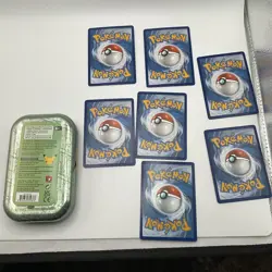 Pokemon TCG Celebrations Mini Tin (Snivy, Tepig & Oshawott) Opened + 7 Cards - Image 3