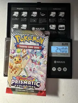 Pokemon Prismatic Evolutions Booster Pack -HEAVY 24.0g- *Possible Demi/God Pack! - Image 1