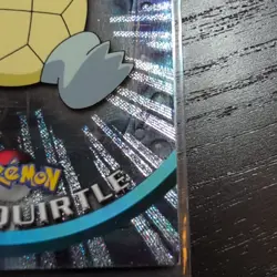 2000 Topps Pokemon Black Logo #07 Squirtle Foil (Silver Rays 2nd Print) - Image 4