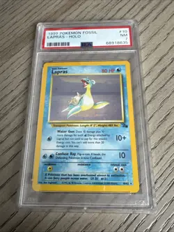 1999 POKEMON FOSSIL #10 LAPRAS-HOLO PSA 7 - Image 1
