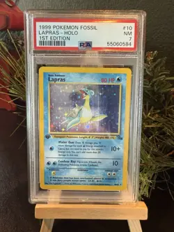 1999 Pokemon Lapras Fossil 1st Edition Holo PSA 7 10/62 - Image 1