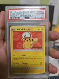 PSA 10 Ash’s Pikachu SM109 Black Star Promo I Choose You Pokemon Card GEM MINT - Image 1