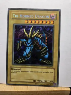 Yu-Gi-Oh! TCG Tri-Horned Dragon LOB-000 Secret Rare Unlimited - Image 1