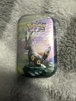 Pokemon TCG Prismatic Evolutions Mini Tin - Factory Sealed (Random Tin) - Image 1