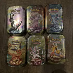 Pokemon TCG Prismatic Evolutions Mini Tin - Factory Sealed (Random Tin) - Image 1