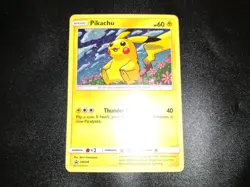 Pikachu SM206 Black Star Promo Cosmos Holo Pokemon Card MP - Image 1