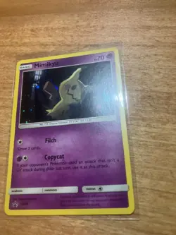Mimikyu SM99 Black Star Promo COSMOS Holo Pokemon Card NM 2017 - Image 1